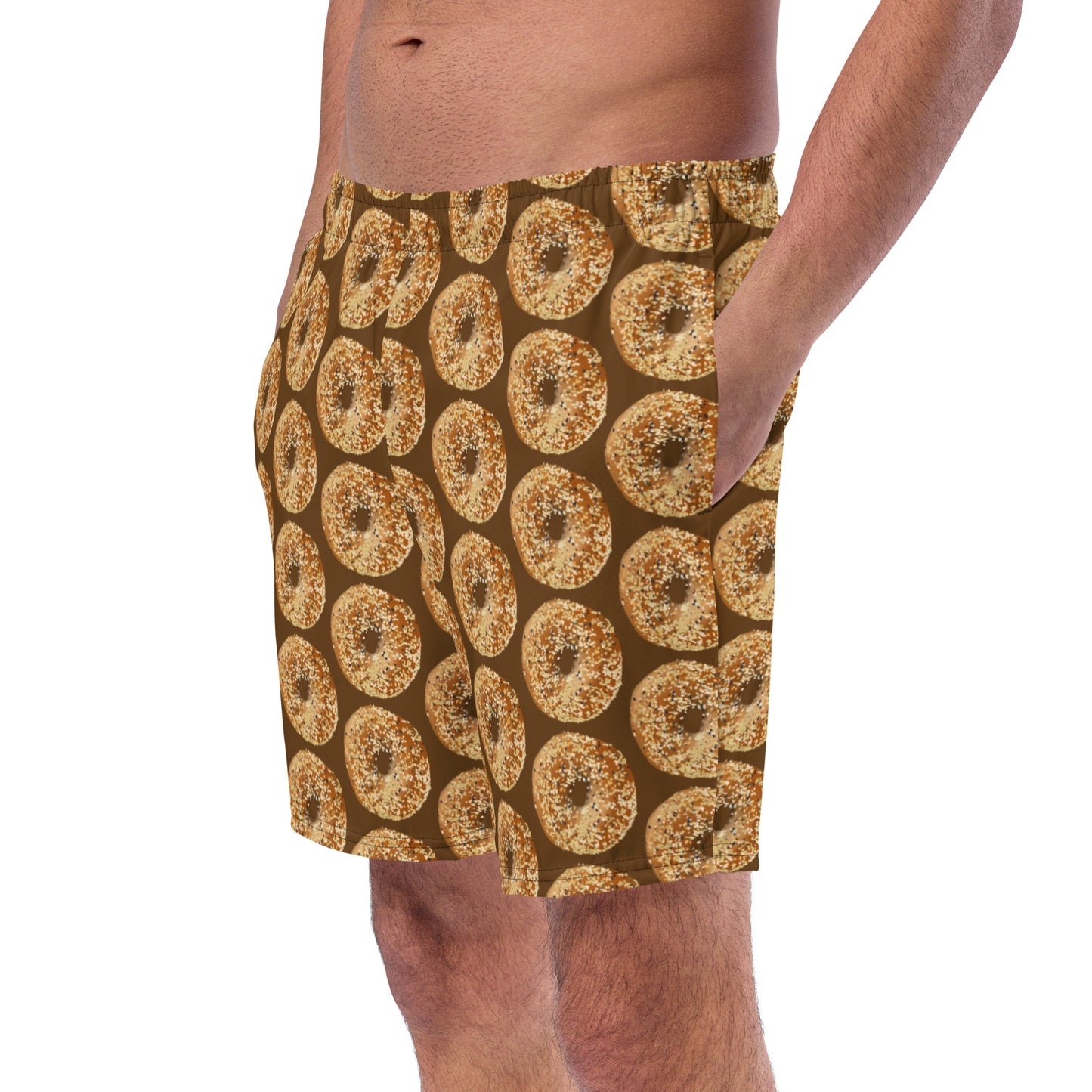 Brown Swimming shorts with everything bagel design - Love bagels? Looking for a gift for an everything bagel enthusiast? Our everything bagel swim trunks are just what you need for the pool, beach, and everything in between —they’re quick-drying and breathable, have multiple pockets, and a silky, anti-chafe inner liner. Eat your favorite bagels in these funny swim shorts. With their unique everything bagel design, they're sure to make a statement.