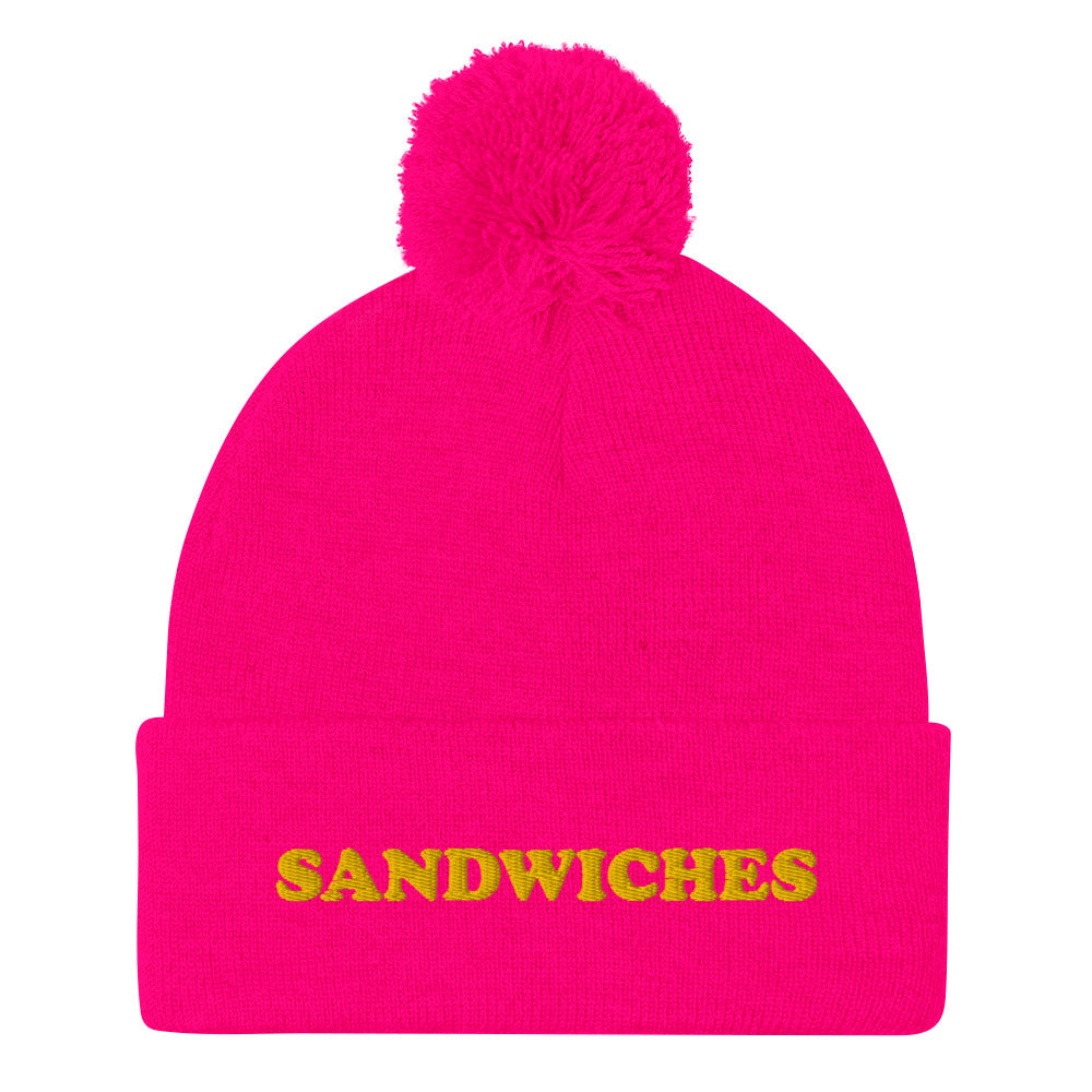 Pink Foodie Beanie - Love sandwiches? This sandwich hat is just for you! It's a warm and cozy beanie with a classic pom pom on top and "sandwich", expertly embroidered on the front. Designed by Nina and made just for you! Looking for something personalized? A different embroidery color? Shoot us an email or check out our customizable apparel!