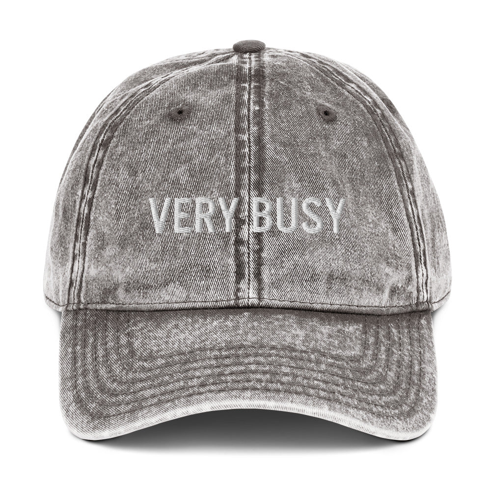 Gray very busy dad hat from Nina's Funky Shop by ninanush - VERY BUSY 🐝 Make a statement with this funny embroidered dad hat for very busy people. It comes in a variety of colors, with a vintage style and an adjustable brass closure. The perfect hat for very busy days or a sarcastic gift for your lazy friend. This unisex dad hat was designed by Nina and made just for you.