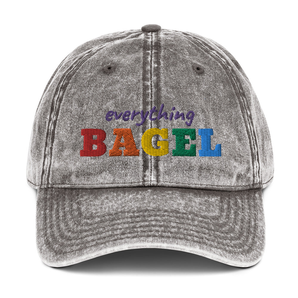 Gray Everything Bagel Hat for Pride -Our Everything Bagel Pride Hat is comfortable, has an adjustable closure, and comes in a variety of colors with a funny rainbow design for pride, expertly embroidered on the front. The perfect hat for pride month and for bagel lovers or all kinds. Celebrate your favorite foods in our funky foodie clothing and accessories. Designed by Nina and made just for you!
