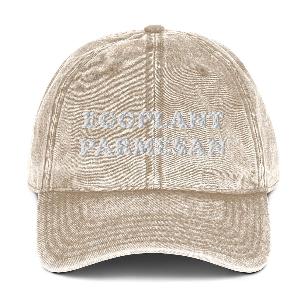 Beige eggplant parmesan dad hat - An eggplant parmesan hat for foodies and Italian food enthusiasts. Celebrate eggplant parm in this funny embroidered dad hat. It's a unique foodie hat that's made just for you. Share your love for eggplant parmesan in this random statement dad hat or give it as a funny gift for foodie or eggplant lovers of all kinds.