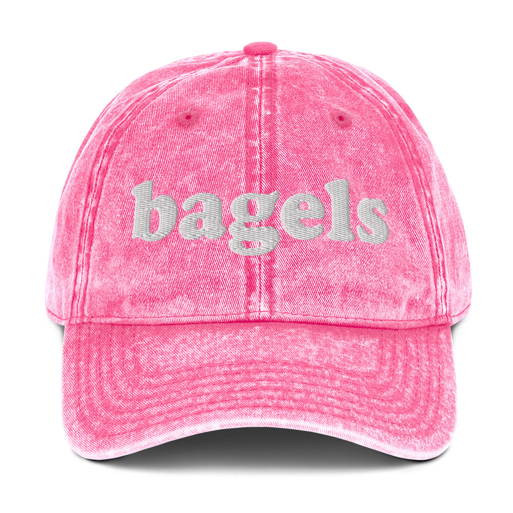 Pink Bagels hat - Make a statement in our Bagels Hat! It's comfortable, adjustable and made with a vintage style cotton that's expertly embroidered just for you. This funny dad hat is perfect for bagel enthusiasts and foodies of all kinds. Looking for something personalized? Shoot us a message!