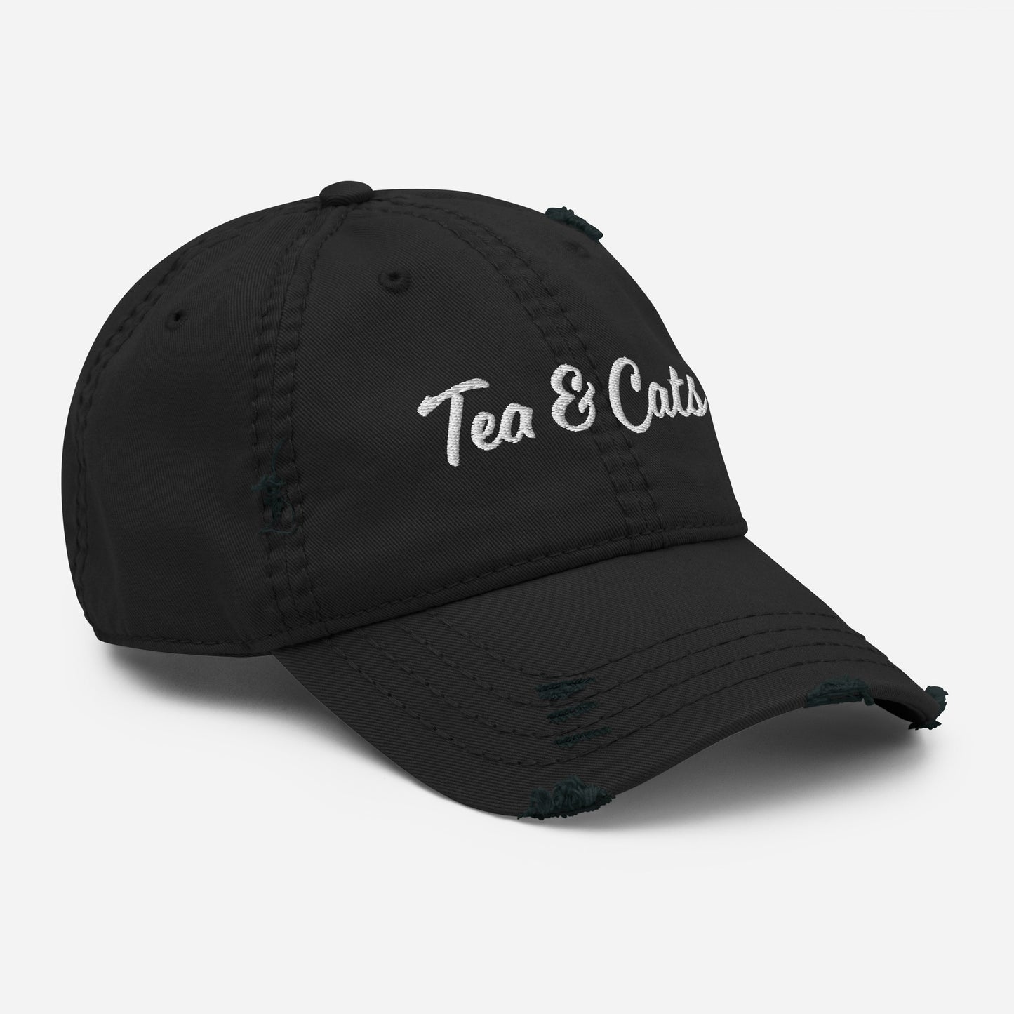Black Tea and Cats Hat - Love cats? Tea drinker? This Tea & Cats Hat is just what you need. It's a comfortable cotton hat with an adjustable closure and "Tea & Cats", expertly embroidered on the front. Stand out in our funny apparel. It's unique, sarcastic, and perfect for everyday foodies. Designed by Nina and made just for you!