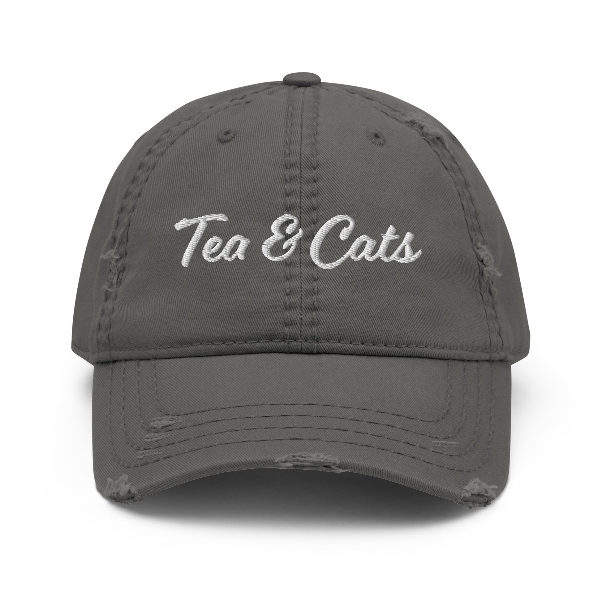 Dark Gray Tea and Cats Hat - Love cats? Tea drinker? This Tea & Cats Hat is just what you need. It's a comfortable cotton hat with an adjustable closure and "Tea & Cats", expertly embroidered on the front. Stand out in our funny apparel. It's unique, sarcastic, and perfect for everyday foodies. Designed by Nina and made just for you! 