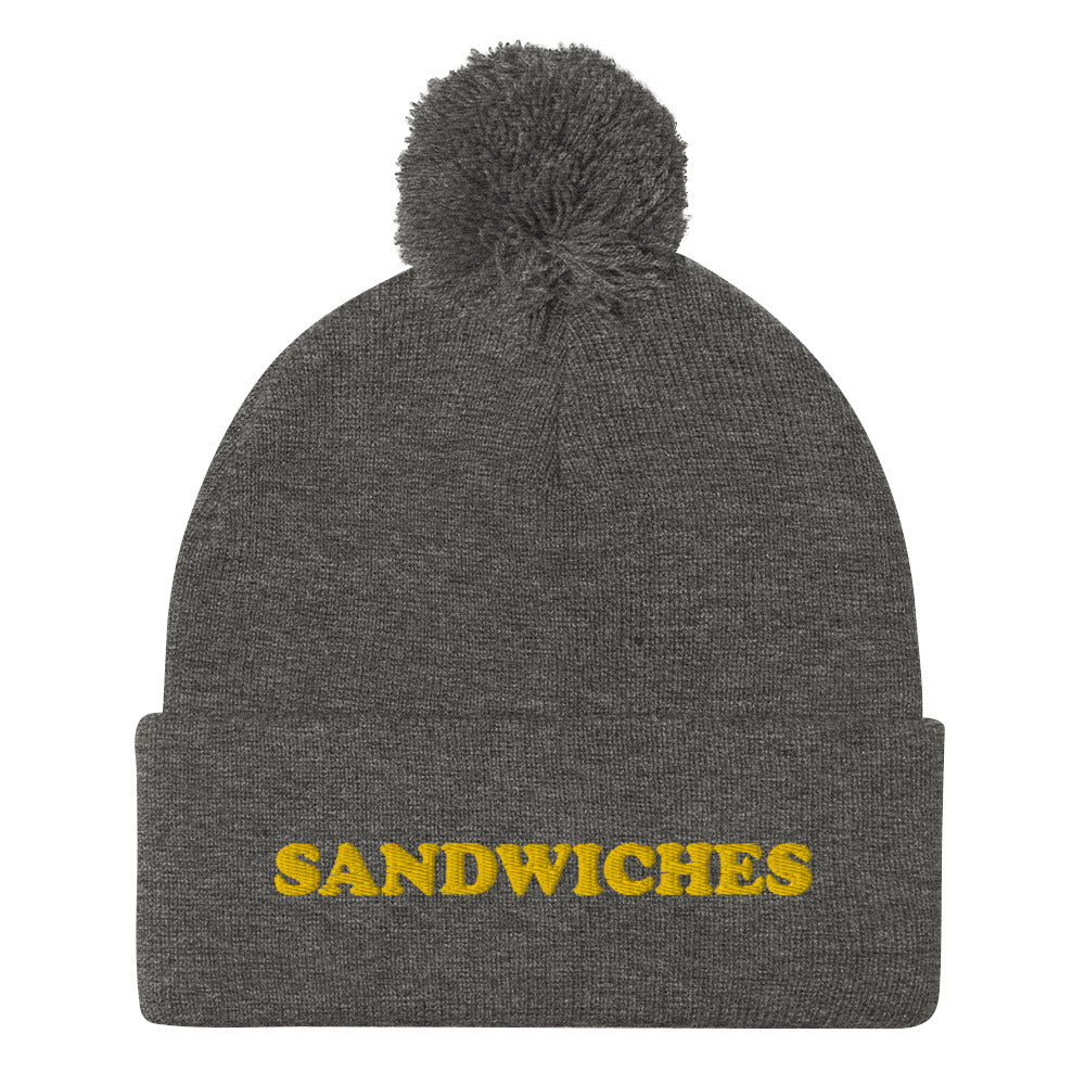 Gray Foodie Hat - Love sandwiches? This sandwich hat is just for you! It's a warm and cozy beanie with a classic pom pom on top and "sandwich", expertly embroidered on the front. Designed by Nina and made just for you! Looking for something personalized? A different embroidery color? Shoot us an email or check out our customizable apparel! 