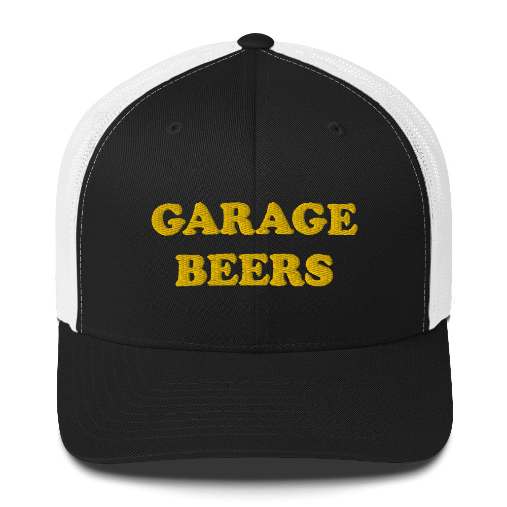 Black and White Garage Beers Trucker Hat from Nina's Funky Shop - Love Beer? Looking for a funny gift for a friend? This Garage Beers Trucker Hat is comfortable, has a convenient adjustable closure and comes in a variety of colors with "garage beers", expertly embroidered on the front. It's a funny trucker hat for everyday beer lovers.