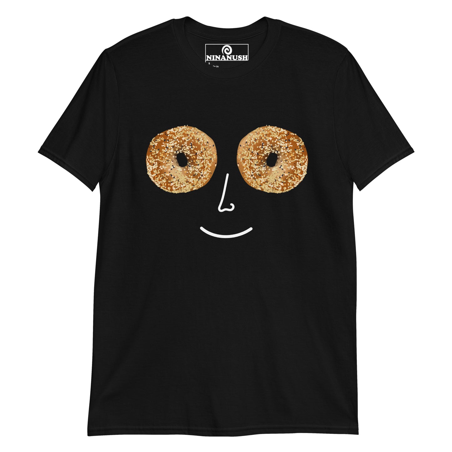 Black Everything Bagel T-shirt from Nina's Funky Shop - Do you love bagels? Looking for a funny gift for a bagel lover? Our Everything Bagel Design T-shirt is just what you need. It's soft, cotton t-shirt with a unique bagel smiley face design and hand drawn bagel eyes. This weird foodie t-shirt is perfect for everyday streetwear or a gift for your favorite bagel enthusiast.