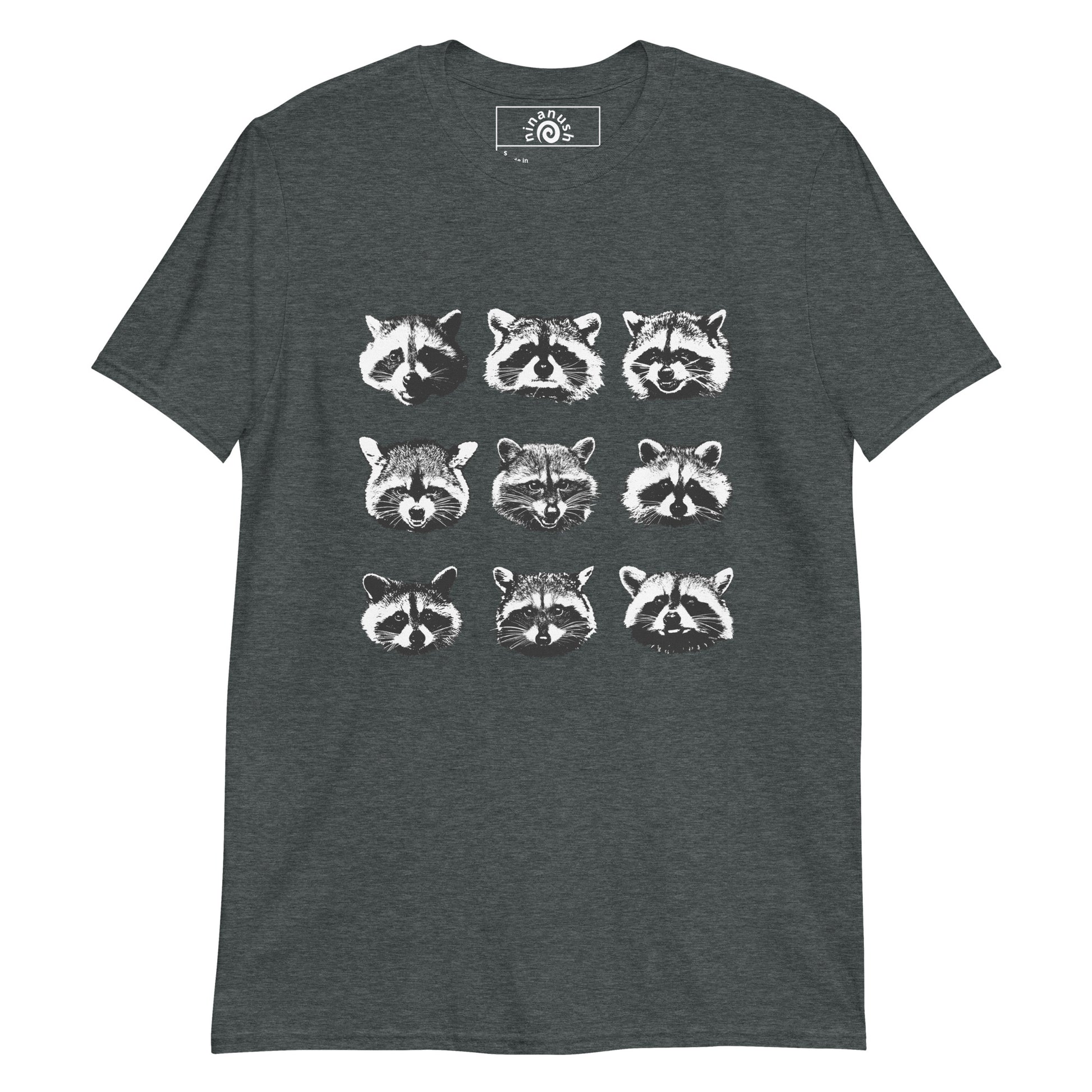 Dark Gray Raccoon Faces T-shirt from Nina's Funky Shop by ninanush - Do you love cute raccoons? Looking for a fun gift for raccoon lovers? This raccoon faces T-Shirt is just what you need. It's a soft and comfortable cotton shirt with nine unique and funny raccoon faces, expertly printed on the front. Stay weird in this funny raccoon t-shirt design. Perfect for raccoon enthusiasts of all kinds.