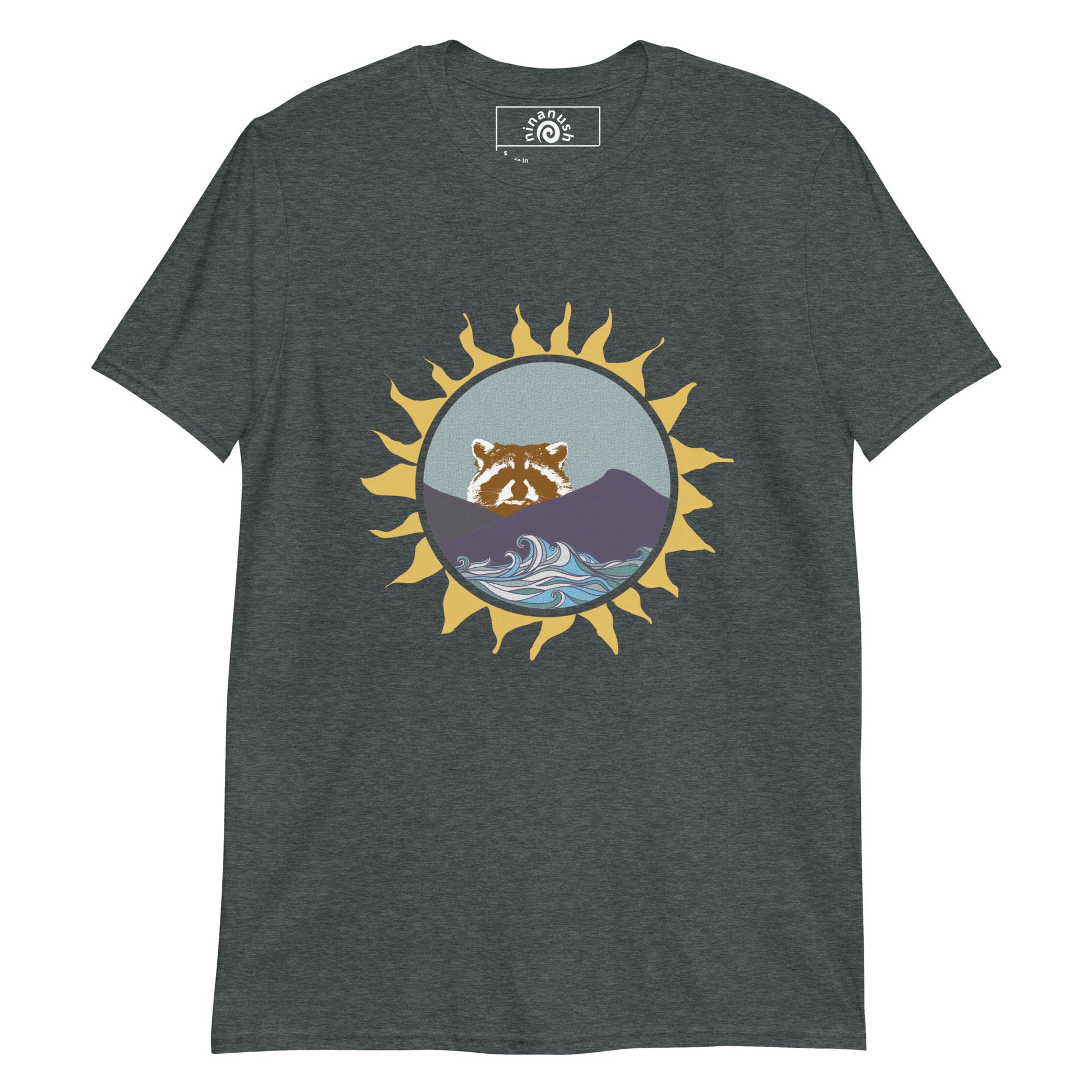 Dark Gray raccoon t-shirt from Nina's Funky Shop by ninanush - Do you love raccoons? Looking for a raccoon graphic tee? Our colorful Raccoon T-shirt design is just what you need. Expertly printed on a soft and comfortable cotton tee. It features a raccoon peering over mountains with blue waves and funky sun frame. Stand out and show off your love of raccoons and quirky tees.