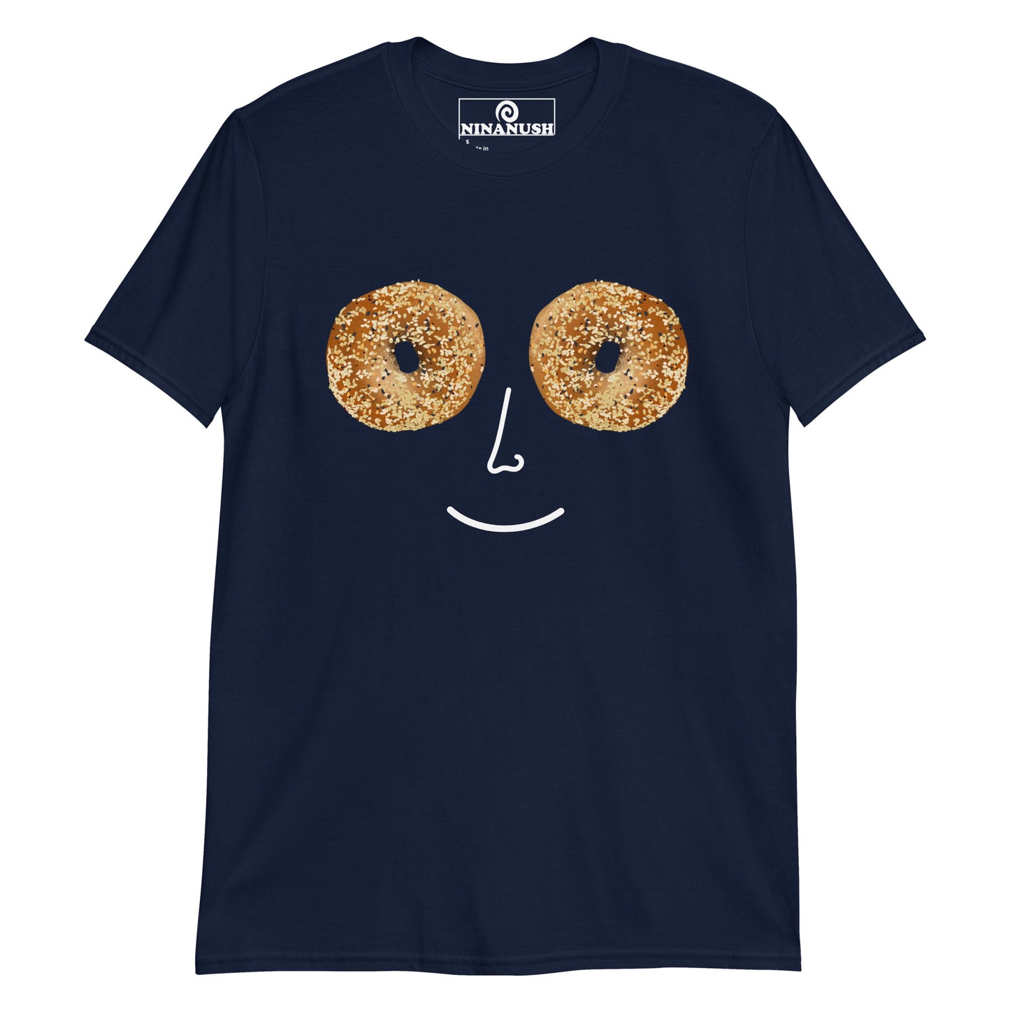 Navy Everything Bagel T-shirt from Nina's Funky Shop - Do you love bagels? Looking for a funny gift for a bagel lover? Our Everything Bagel Design T-shirt is just what you need. It's soft, cotton t-shirt with a unique bagel smiley face design and hand drawn bagel eyes. This weird foodie t-shirt is perfect for everyday streetwear or a gift for your favorite bagel enthusiast.