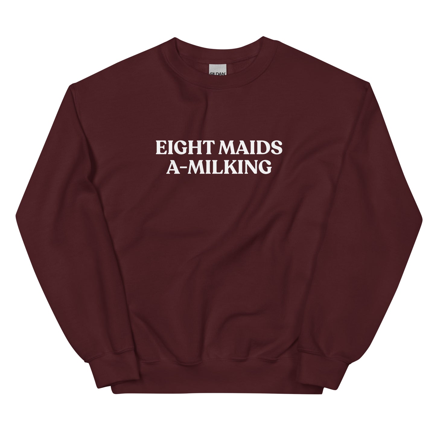 Maroon Eight Maids A-Milking Eighth Day Of Christmas Sweatshirt from Nina's Funky Shop by ninanush - Looking for a unique Christmas sweatshirt? A funny holiday gift for a friend? Our Eighth day of Christmas Sweatshirt is made just for you. It comes in a variety of colors with "Eight Maids A-Milking", expertly printed on the front. Designed by Nina, this funny Christmas sweatshirt is perfect for your next holiday party.