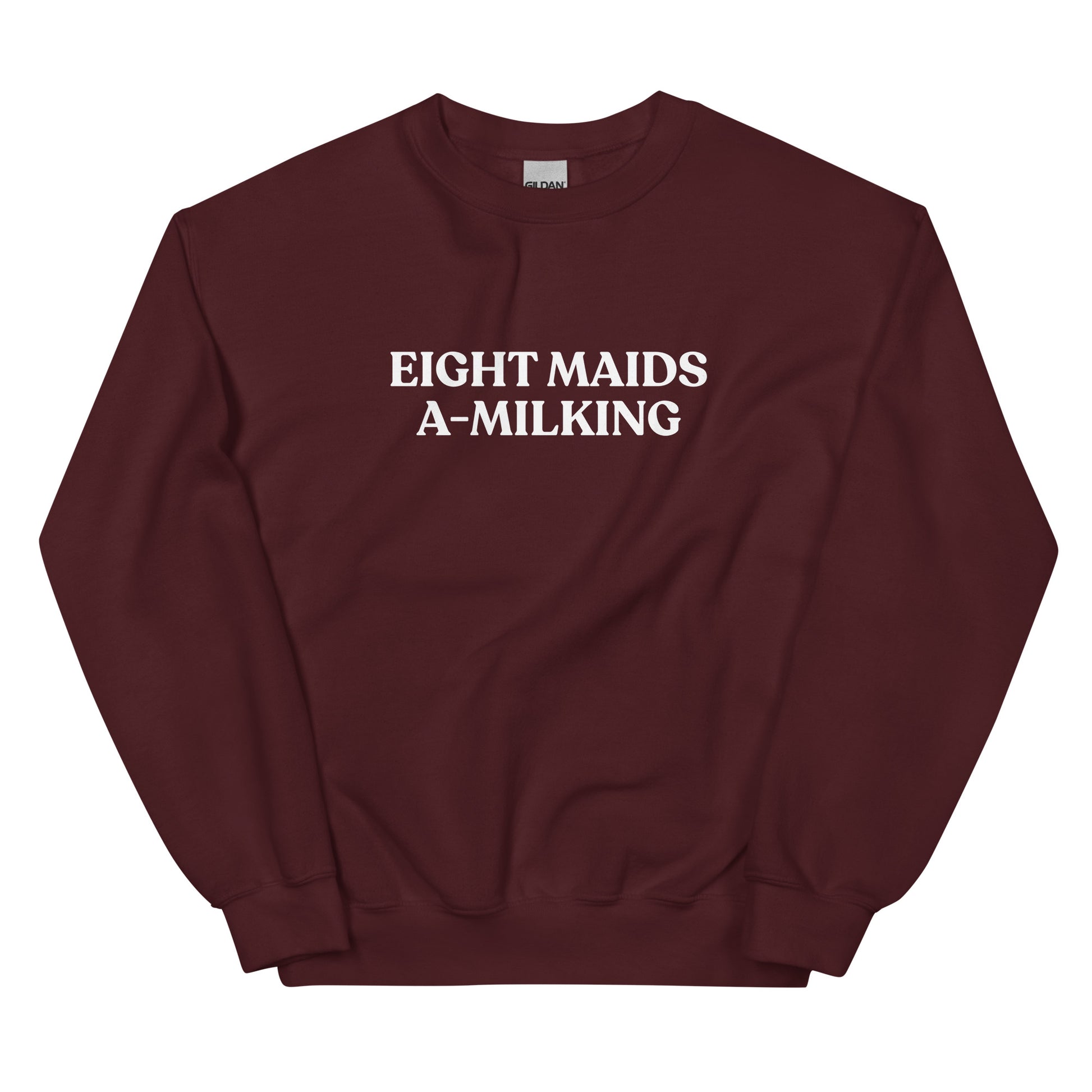 Maroon Eight Maids A-Milking Eighth Day Of Christmas Sweatshirt from Nina's Funky Shop by ninanush - Looking for a unique Christmas sweatshirt? A funny holiday gift for a friend? Our Eighth day of Christmas Sweatshirt is made just for you. It comes in a variety of colors with "Eight Maids A-Milking", expertly printed on the front. Designed by Nina, this funny Christmas sweatshirt is perfect for your next holiday party.