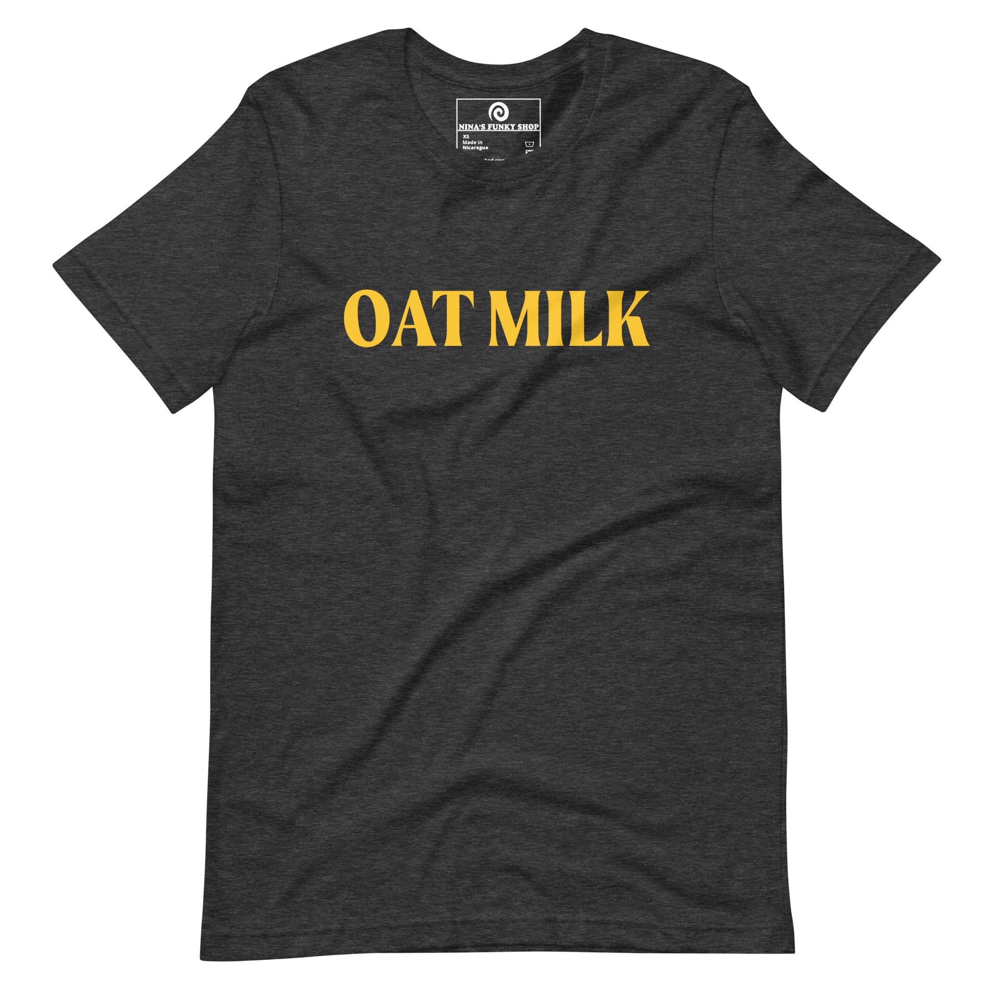 Dark Gray Oat Milk T-shirt - Are you an oat milk enthusiast? Looking for a funny gift for a dairy free friend? Our Oat Milk T-shirt is soft, comfortable and just what you need. It's a unisex t-shirt that comes in a variety of colors with "oat milk", on the front. A funny t-shirt for plant based babes and foodies of all kinds. Celebrate your favorite foods in our funky foodie apparel. Designed by Nina and made just for you!