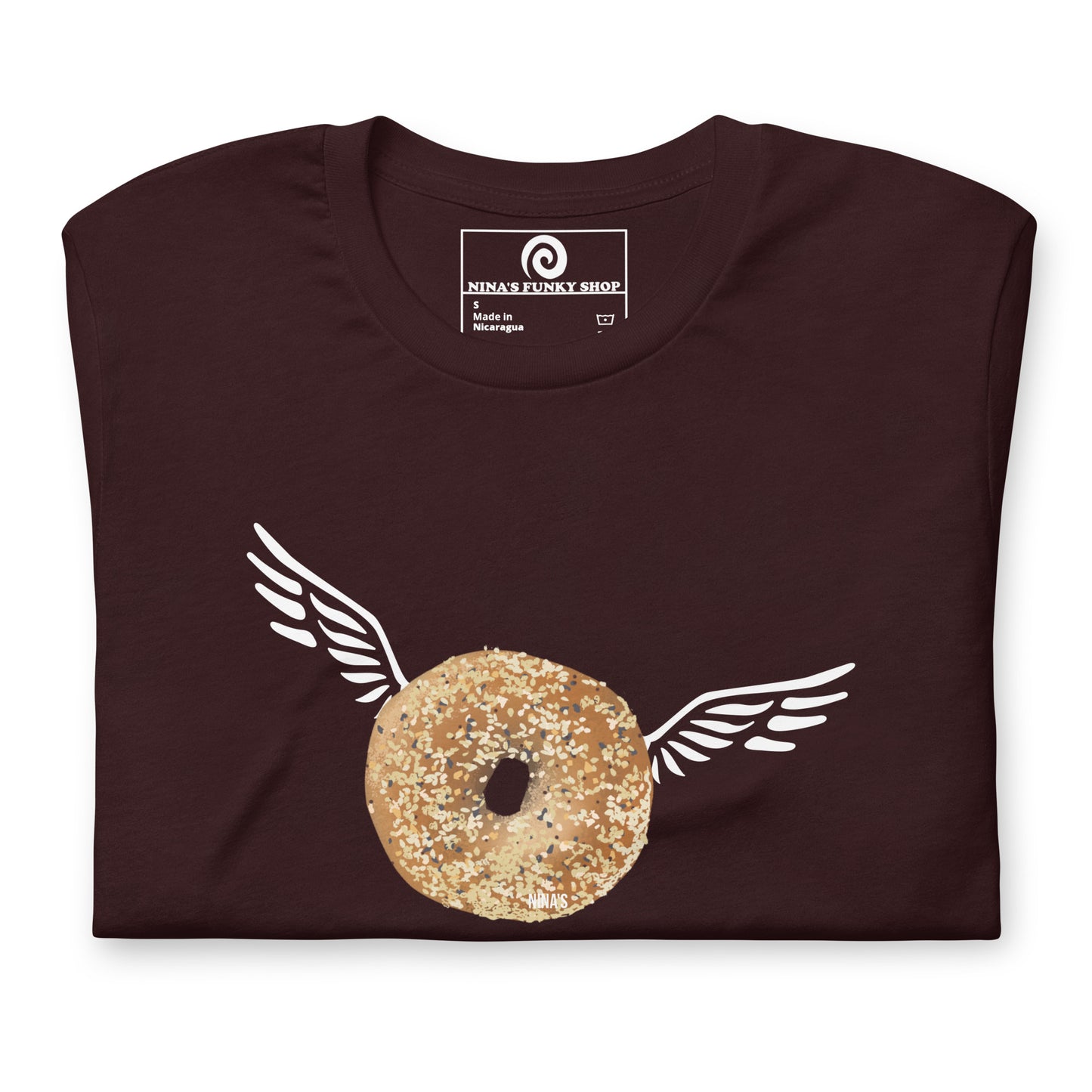 Oxblood Black Angel Bagel T-Shirt - Do you love everything bagels? Looking for a gift for your favorite bagel enthusiast? This Angel Bagel T-shirt is just what you need! It's a soft and comfortable with a funky hand drawn bagel design, expertly printed on the front. Celebrate your favorite foods in our funky foodie clothing, designed by Nina and made just for you.