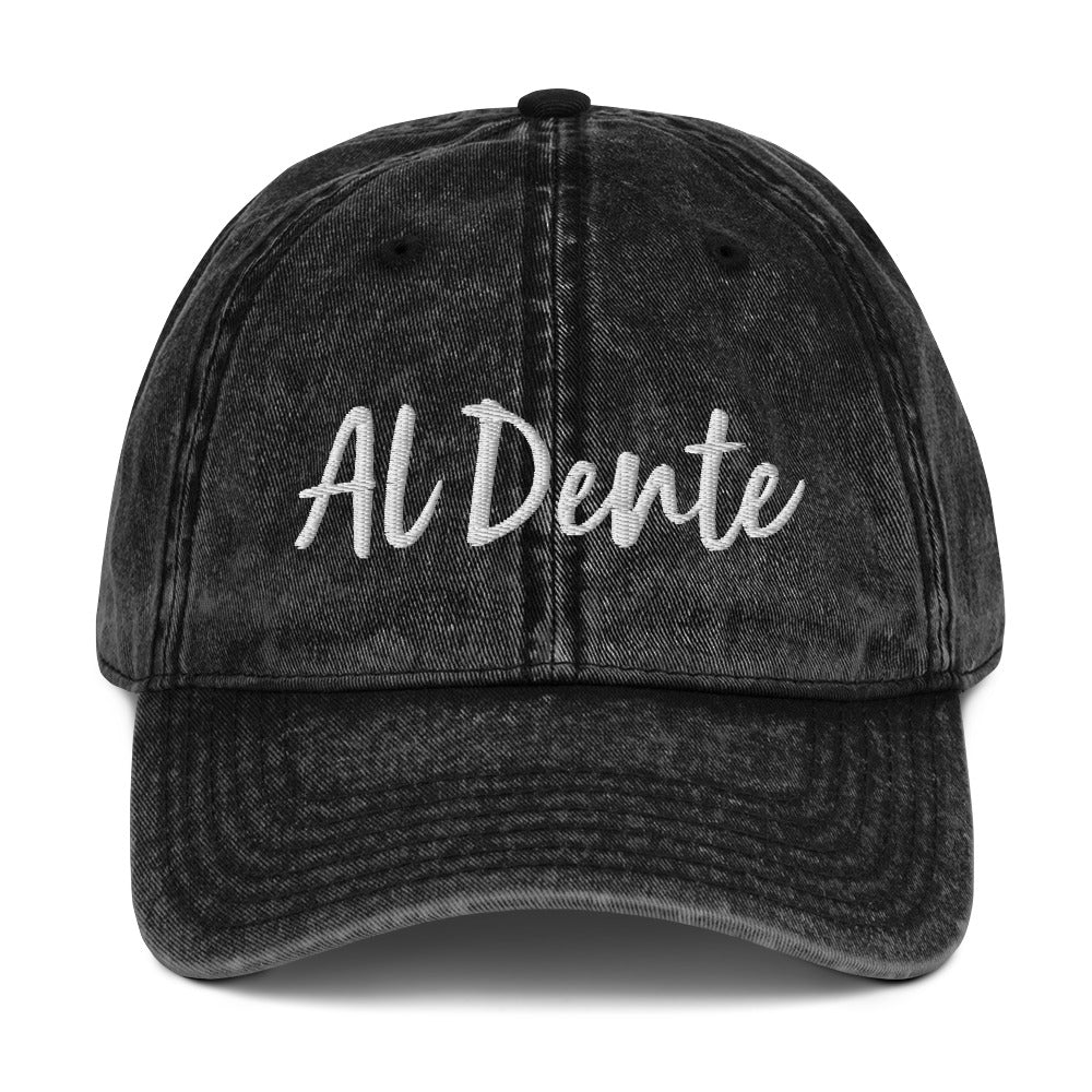 Black Al Dente Hat - This Al Dente Hat is perfect for pasta lovers and foodies of all kinds. It's comfortable, has an adjustable closure, and comes in a variety of colors with "Al Dente", expertly embroidered on the front. Celebrate your favorite foods in our funky foodie clothing and accessories. Designed by Nina and made just for you!
