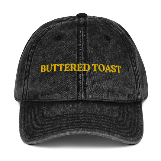 Black Buttered Toast Hat - Love buttered toast? Looking for a gift for a foodie? Our Buttered Toast Dad Hat is comfortable, adjustable and made just for you. It's a funny dad hat, expertly embroidered. Perfect for everyday streetwear or a gift for a buttered toast enthusiast! 
