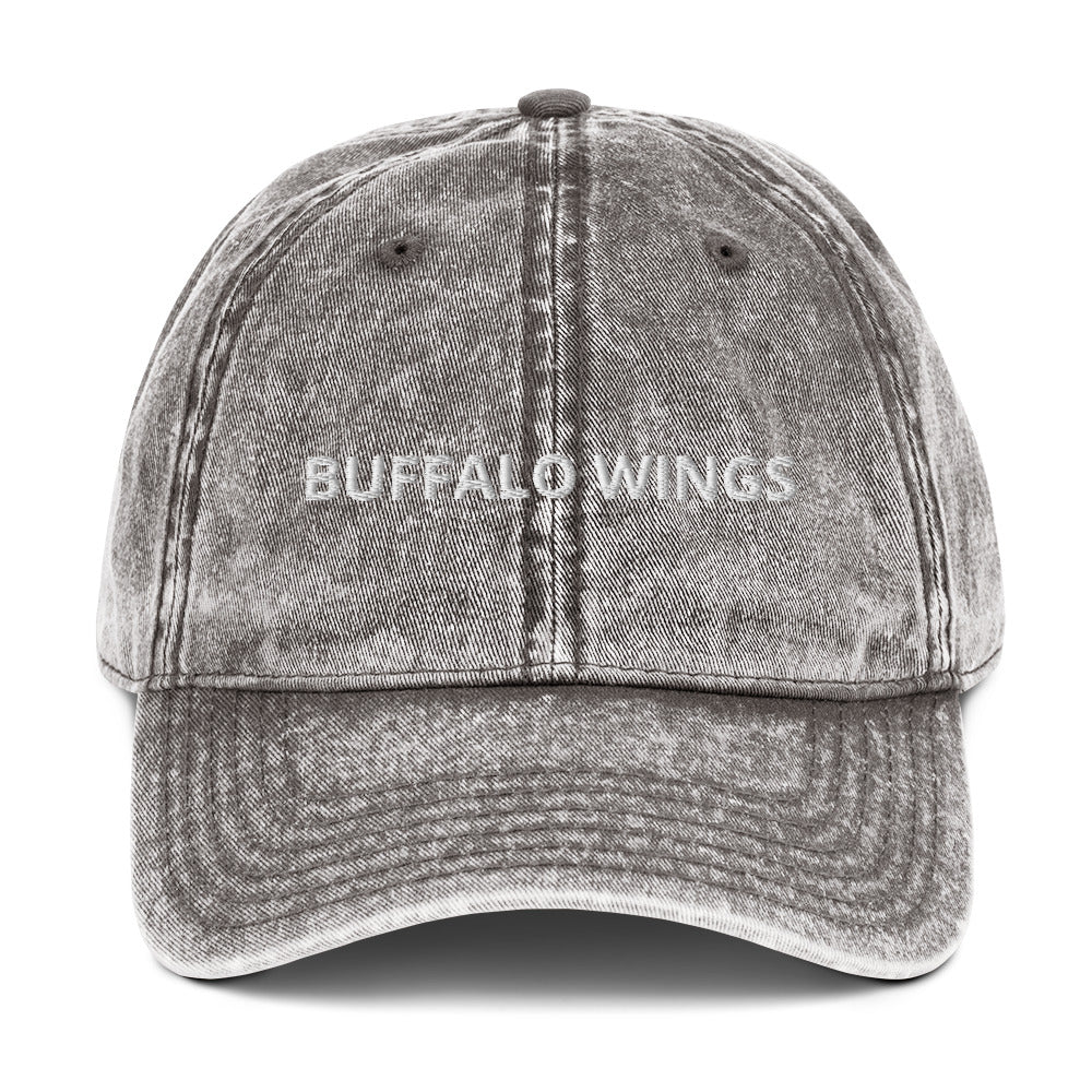 Gray Buffalo Wings Hat - Love buffalo wings? Looking for a gift for a friend? Our Buffalo Wings Hat might be just what you need. It's made of comfortable cotton, has an adjustable closure and "buffalo wings", expertly embroidered on the front. Make a statement in this funny food dad hat, perfect or buffalo wing enthusiasts and foodies of all kinds.