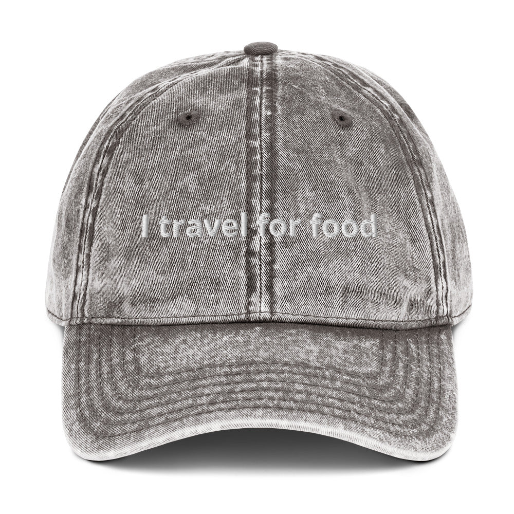 Gray I Travel For Food Hat - $1000 flight to Thailand for $2 pad Thai? Yes please! Our "I travel for food" hat is comfortable and has an adjustable closure. It comes in a variety of colors with a funny travel saying for foodies, expertly embroidered on the front. This dad hat is perfect for travelers and foodies alike.