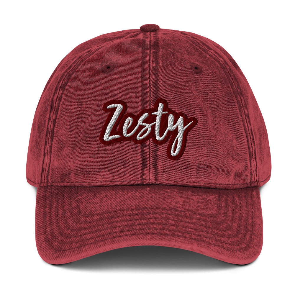 Maroon zesty hat - The Zesty Dad Hat, a perfect accessory to add a touch of personality to your outfit. With a vintage-style faded look, a red and white unique embroidery, and an adjustable strap, this quirky dad hat was made just for you. Wear this colorful dad hat as everyday wear or give this hat as a funny gift to a zesty friend.