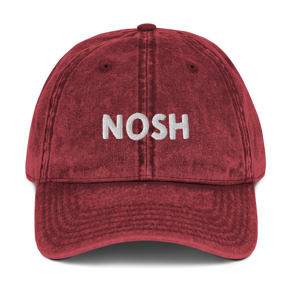Maroon nosh hat - A nosh hat with a simple text embroidery, vintage-style faded material and it comes in a variety of colors. It's a funny dad hat for foodies or a gift for noshers and food enthusiasts. Nosh on your favorite foods in this yiddish word hat. It's a perfect hat for everyday wear and a unique dad hat for snack lovers.