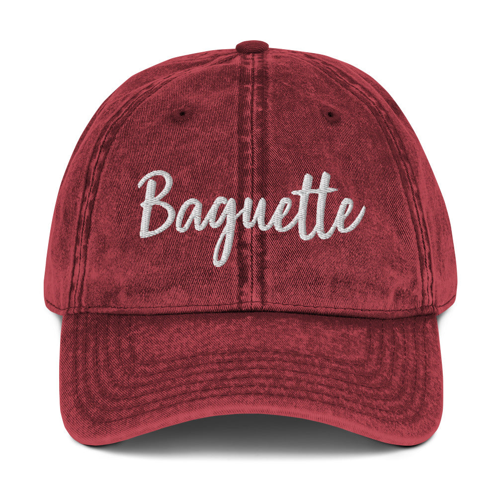 Maroon baguette hat from Nina's Funky Shop by ninanush - Everyone loves a Baguette. Show your love for the classic French bread in this funny foodie dad hat. It's has a stylish washed out material and "Baguette", embroidered on the front. It's a unique accessory that gives personality to your everyday outfit. Stay funky and eat baguettes in this baguette enthusiast hat. 