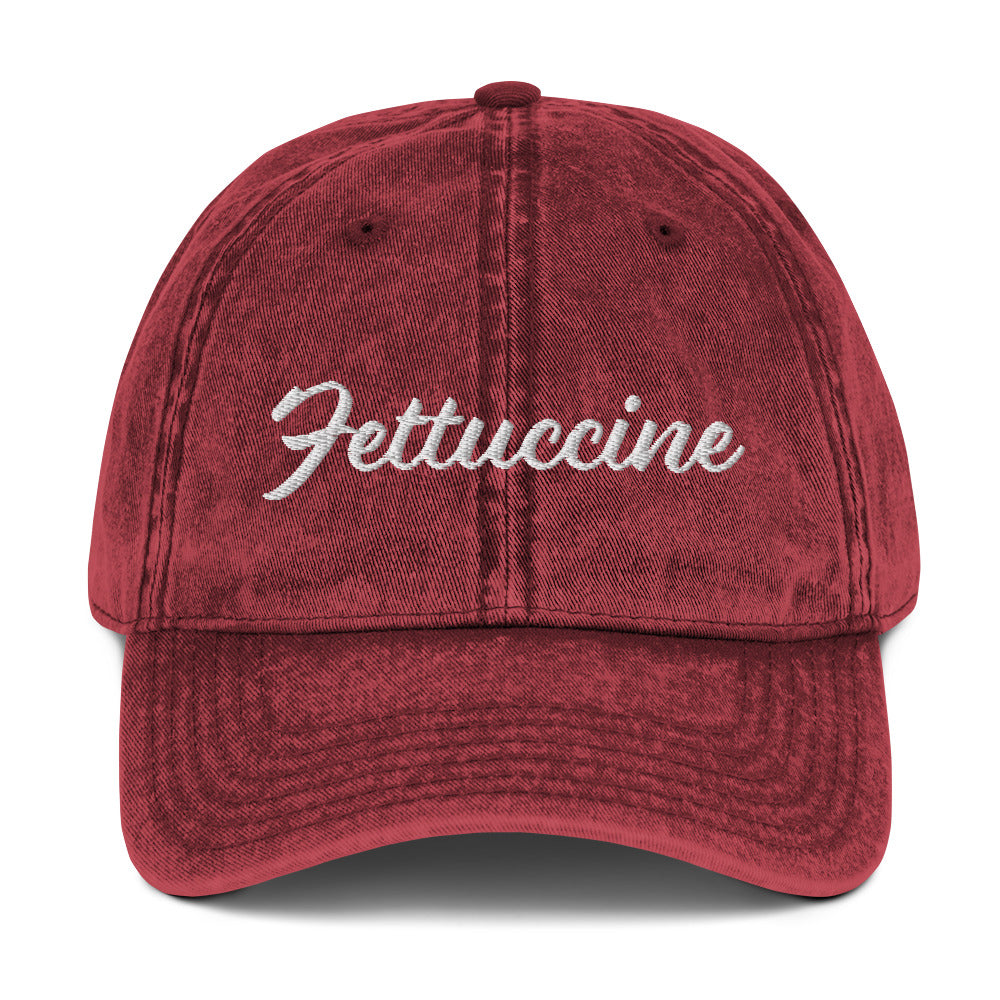 Maroon Fettuccine Hat - Love fettuccine? Looking for a funny gift for a pasta enthusiast? This Unique Fettuccine Hat is just what you need. It's comfortable, and comes in a variety of colors with "Fettuccine", expertly embroidered on the front. Eat your favorite pasta in this funny foodie dad hat. Perfect for fettuccine lovers and beyond.