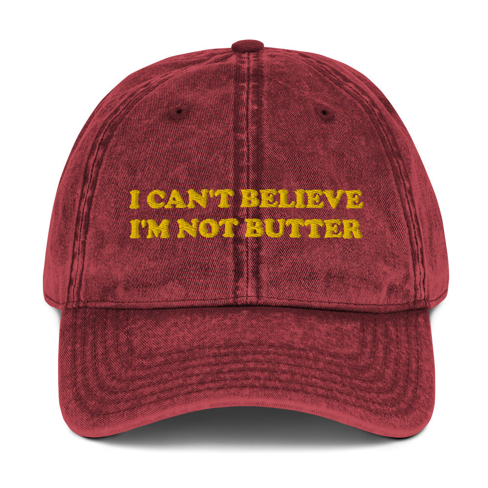 Maroon Hat with funny saying - Make a statement in this cotton dad hat with "I can't believe I'm not butter", expertly embroidered on the front. It's a funny hat that is sure to have people asking, "Where'd you get that hat?" Looking for something personalized? Shoot us an email!