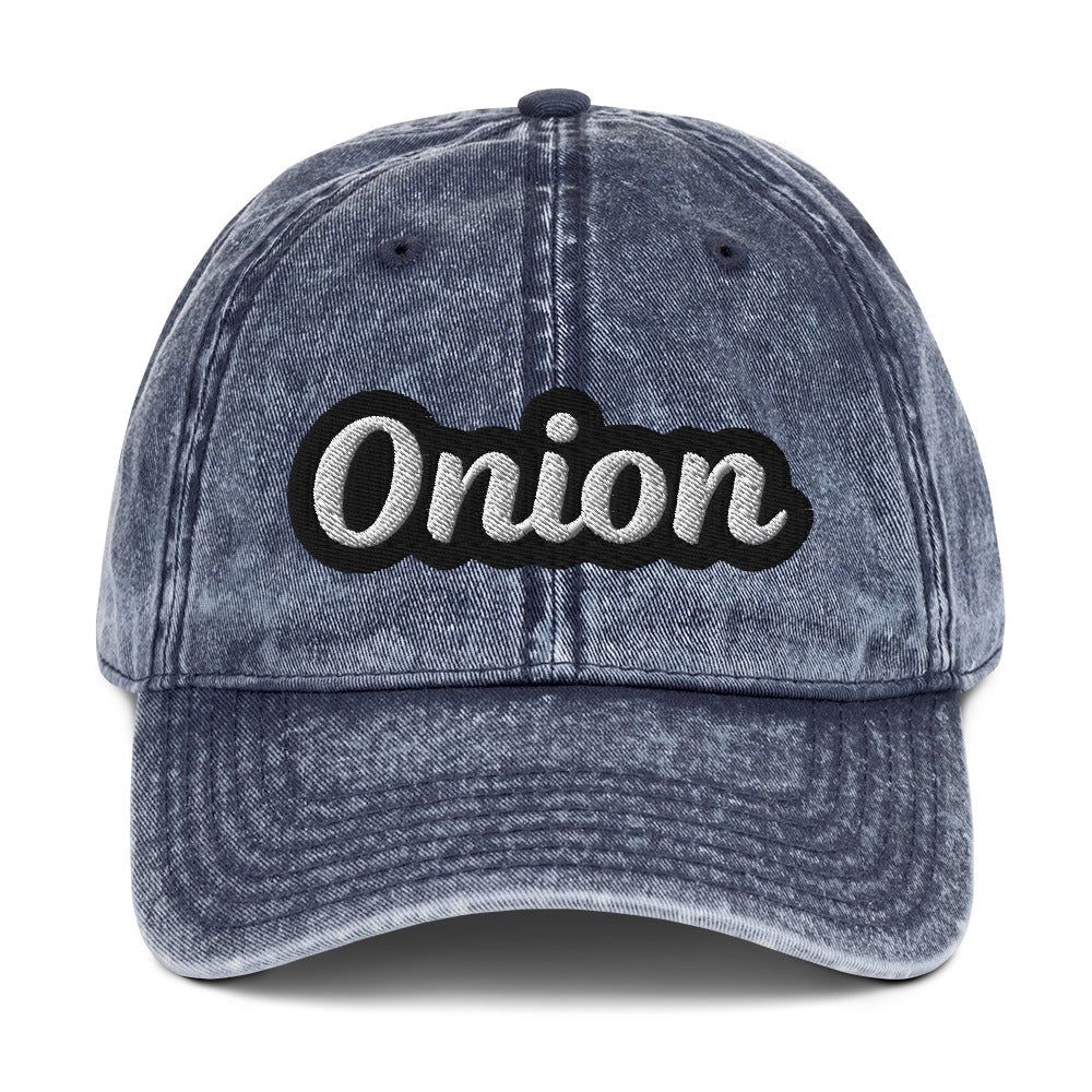 Blue onion hat from Nina's Funky Shop by ninanush - This onion dad hat is comfortable, adjustable and the perfect weird hat for everyday fashion. It has a faded vintage-style material, expertly embroidered with the word "onion". Wear this onion hat and make a statement or give it as a gift to an onion enthusiast. Celebrate your favorite foods in our funny food hats, tees and accessories.
