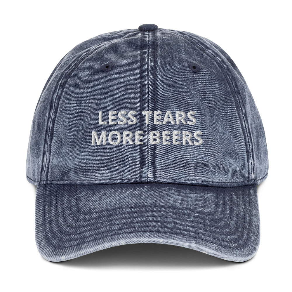 Blue Less Tears More Beers Hat - Our Less Tears More Beers Hat is made of comfortable cotton. It has an adjustable closure and a funny beer saying, expertly embroidered on the front. Let your hat do the talking. This accessory is perfect for everyday streetwear, a funny hat for a college student or a gift for your favorite beer enthusiast.