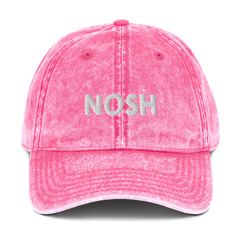 Pink nosh hat - A nosh hat with a simple text embroidery, vintage-style faded material and it comes in a variety of colors. It's a funny dad hat for foodies or a gift for noshers and food enthusiasts. Nosh on your favorite foods in this yiddish word hat. It's a perfect hat for everyday wear and a unique dad hat for snack lovers.