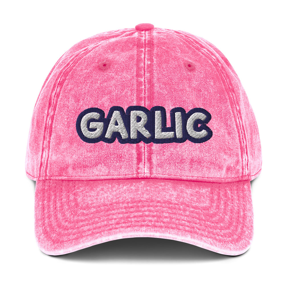 Pink garlic dad hat from Nina's Funky Shop by ninanush - If you're a garlic lover, this funny food hat was designed just for you. Eat garlic in style and make a statement in this stand out foodie dad hat. It's a garlic lover hat that's made of cotton, with a washed out vintage style and an eye-catching blue and white embroidery. Perfect for garlic enthusiasts and foodies of all kinds.