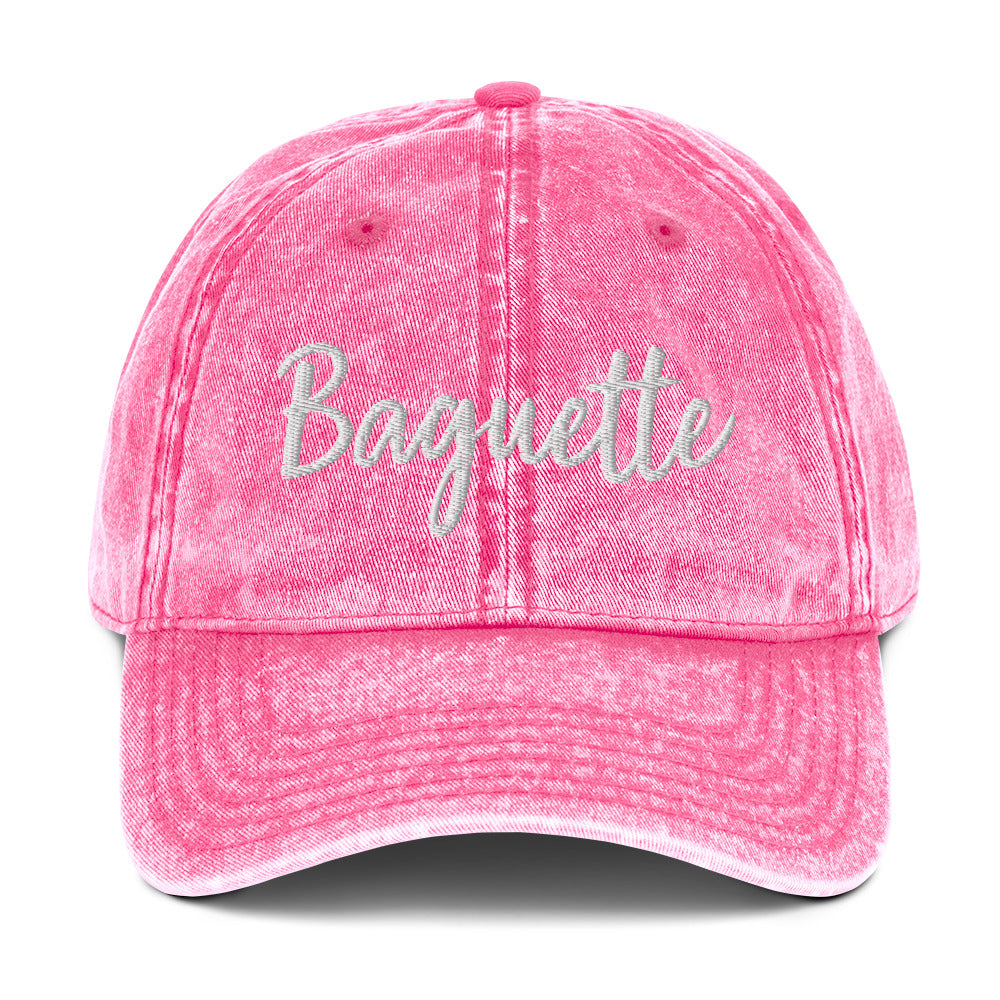 Pink French baguette hat from Nina's Funky Shop by ninanush - Everyone loves a Baguette. Show your love for the classic French bread in this funny foodie dad hat. It's has a stylish washed out material and "Baguette", embroidered on the front. It's a unique accessory that gives personality to your everyday outfit. Stay funky and eat baguettes in this baguette enthusiast hat.