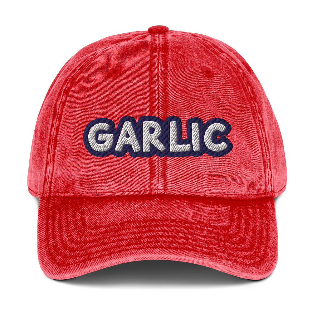 Red garlic dad hat from Nina's Funky Shop by ninanush - If you're a garlic lover, this funny food hat was designed just for you. Eat garlic in style and make a statement in this stand out foodie dad hat. It's a garlic lover hat that's made of cotton, with a washed out vintage style and an eye-catching blue and white embroidery. Perfect for garlic enthusiasts and foodies of all kinds.