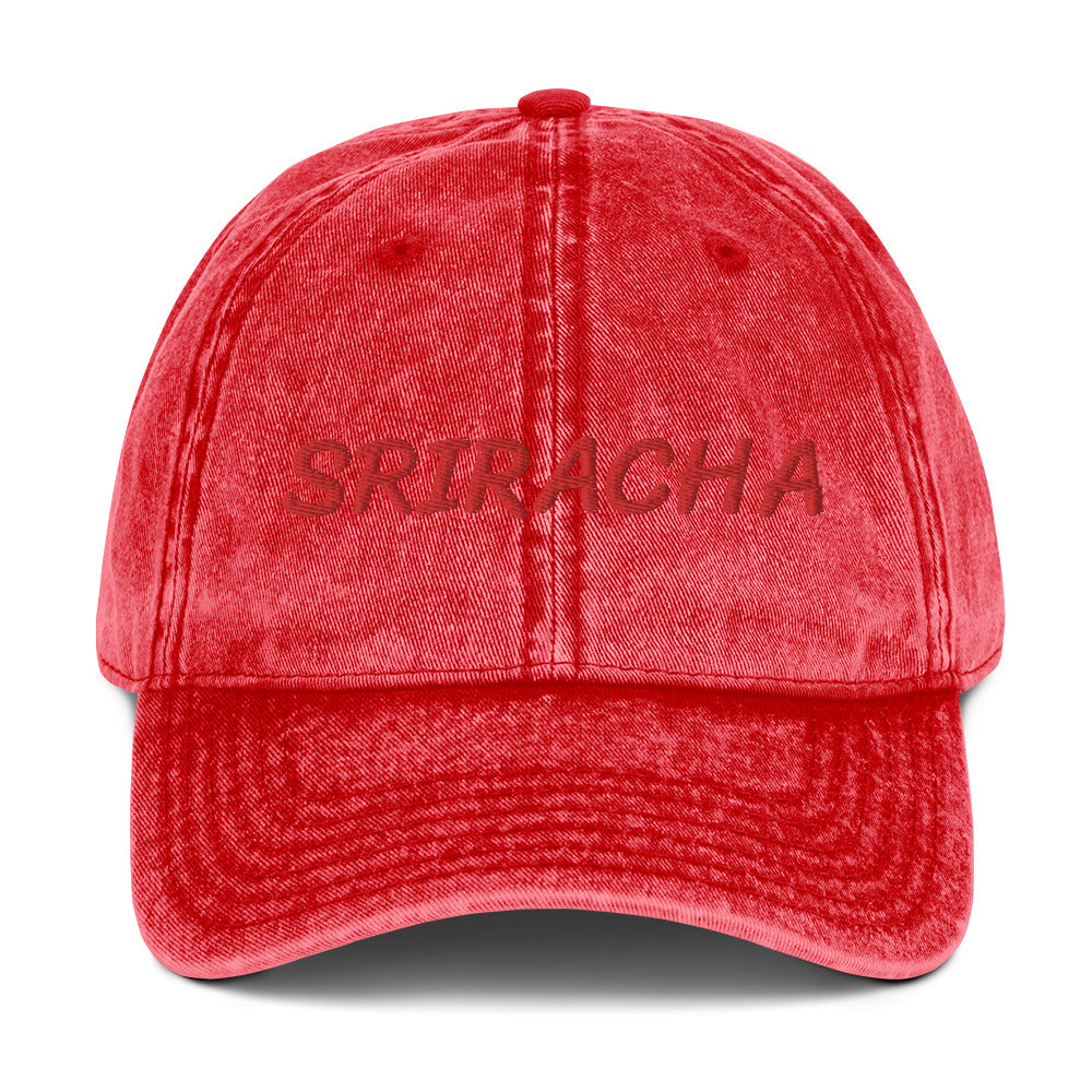 Red sriracha dad hat from Nina's Funky Shop by ninanush - The Sriracha dad hat! Show your love for the beloved hot chili sauce in this funny foodie dad hat. It's comfortable with the word "Sriracha", embroidered on the front. It's a unique accessory that brings personality to your everyday outfits. Stay funky and eat your favorite hot sauce in this sriracha enthusiast hat.