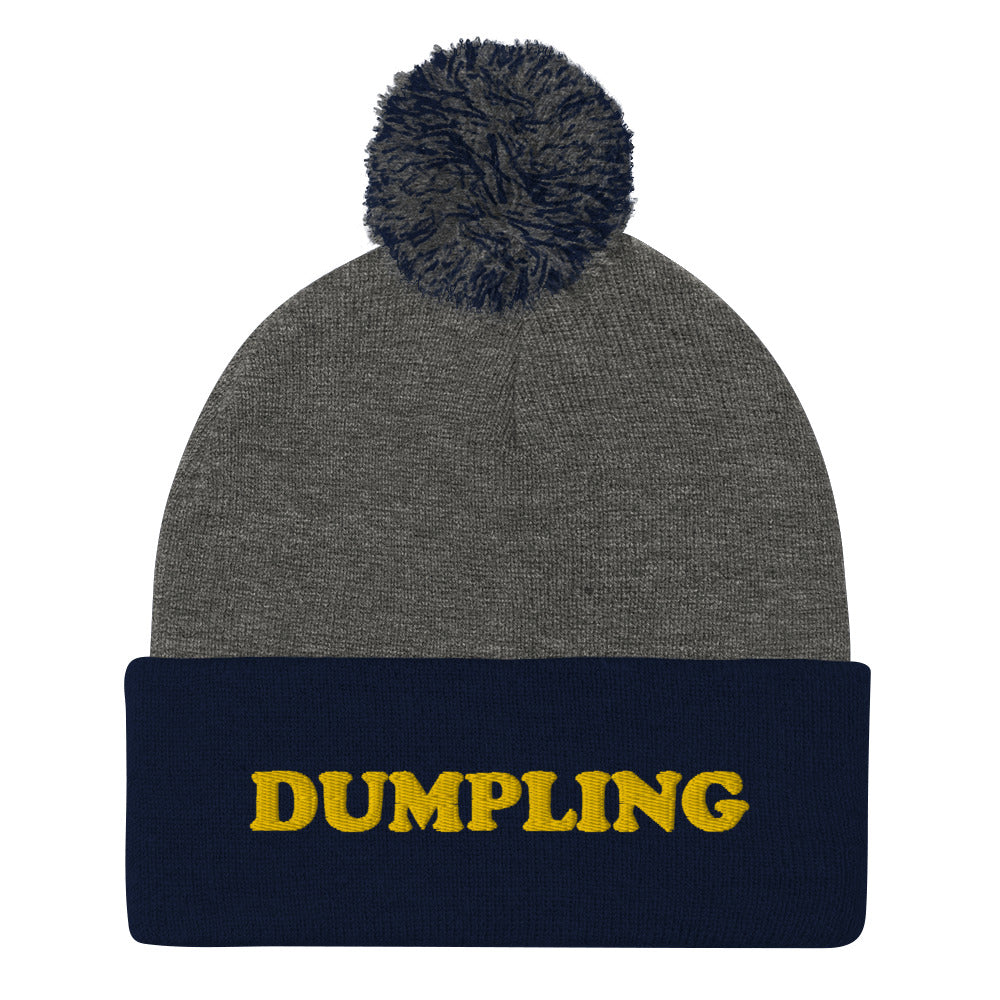Navy blue and gray weird food beanie - Are you a dumpling enthusiast? This dumpling beanie hat is all you've been missing. Now you can eat your favorite dumplings in a unique dumpling hat with a classic pom pom on top. Stay weird and stay warm in this cozy and unusual food beanie hat.  Celebrate your favorite dumplings in our funky foodie beanies & clothing.